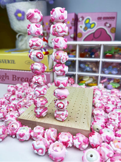 Pink hand-painted beads