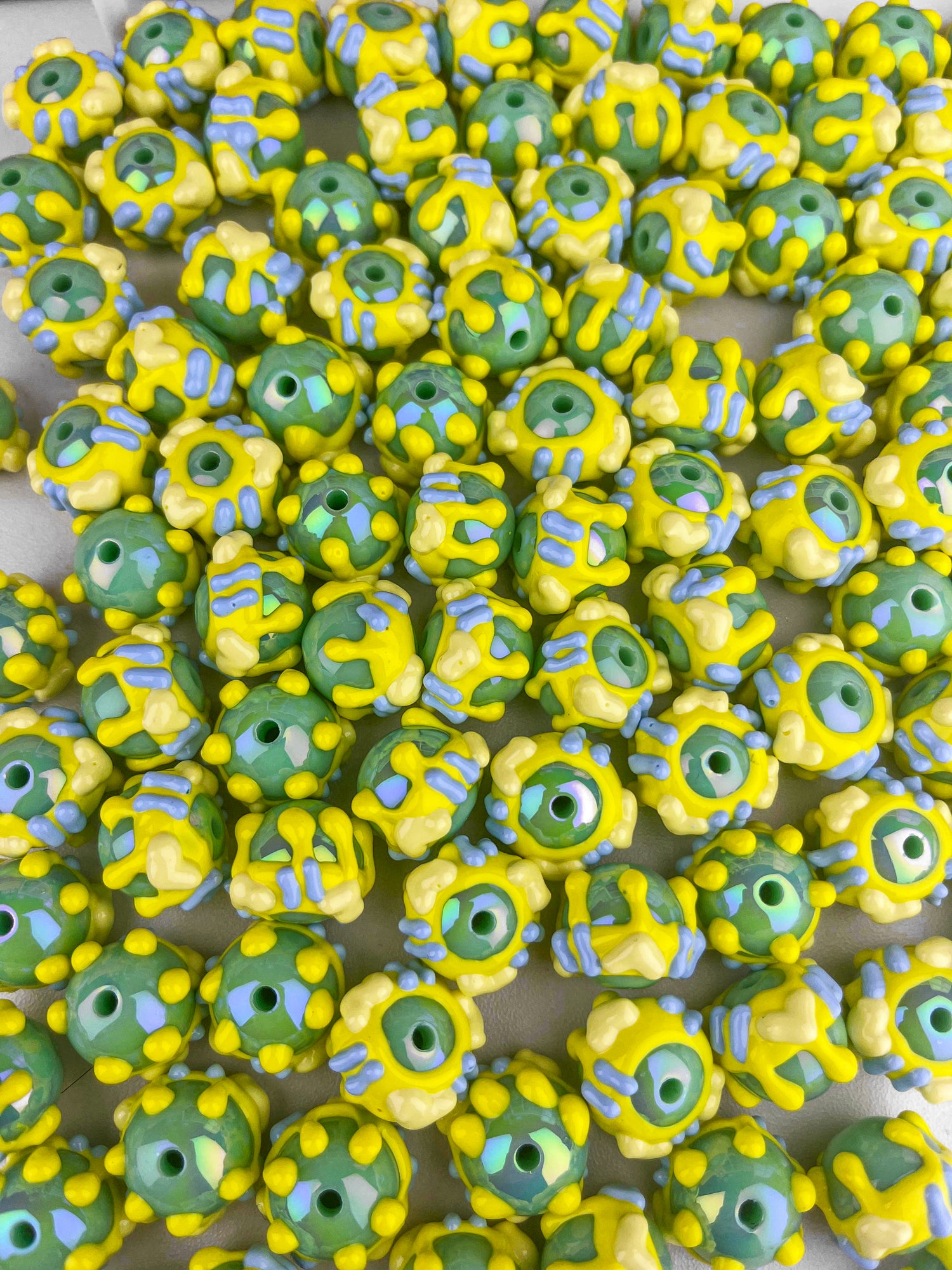 Green and yellow hand painted beads