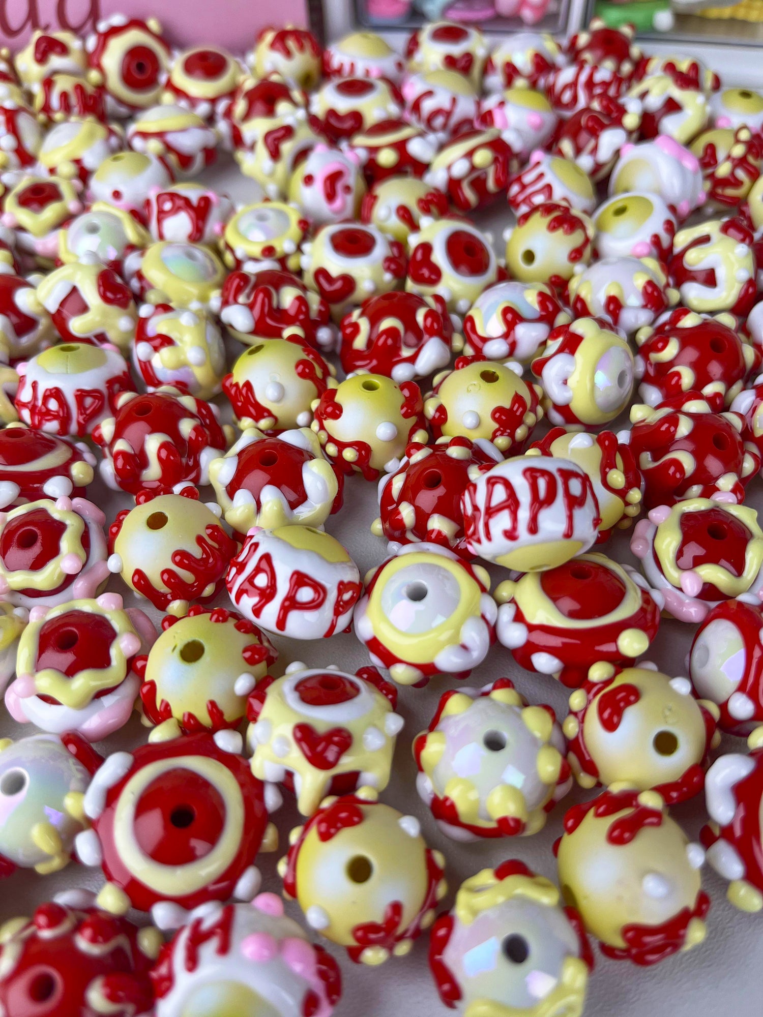 Happy limited edition red hand-painted beads